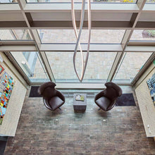 Load image into Gallery viewer, In The Wind LED Pendant Light in living room.
