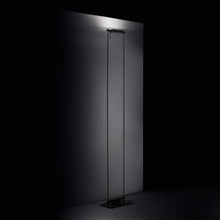 Load image into Gallery viewer, Logo Floor Lamp in exhibition.
