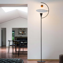 Load image into Gallery viewer, Newton LED Floor Lamp in living room.
