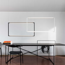 Load image into Gallery viewer, Spigolo LED Pendant Light in office.
