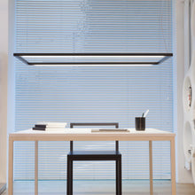 Load image into Gallery viewer, Spigolo LED Pendant Light in office.
