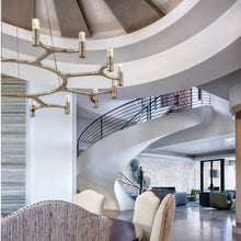 Load image into Gallery viewer, Nexus LED Chandelier in living room.
