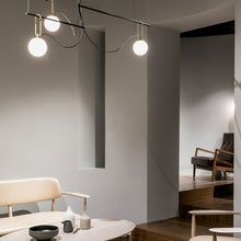 Load image into Gallery viewer, NH Linear Suspension Light in living room.
