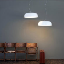 Load image into Gallery viewer, Canopy LED Pendant Light in living room.
