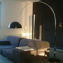 Load image into Gallery viewer, Coupe Arch Floor Lamp in living room.
