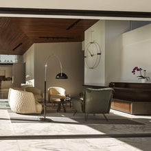 Load image into Gallery viewer, Coupe Arch Floor Lamp in living room.
