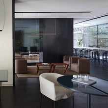 Load image into Gallery viewer, Ilo LED Horizontal Pendant Light in living room.
