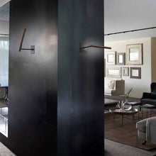Load image into Gallery viewer, Ilo LED Wall Light in living room.
