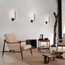 Load image into Gallery viewer, Ilo LED Wall Light in living room.
