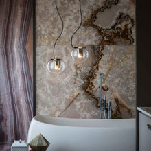 Load image into Gallery viewer, The Globe Pendant Light in bathroom.
