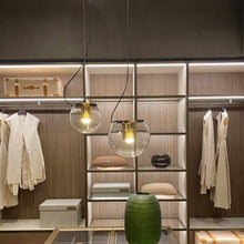 Load image into Gallery viewer, The Globe Pendant Light in dressing room.
