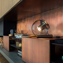 Load image into Gallery viewer, The Globe Table Lamp in living room.
