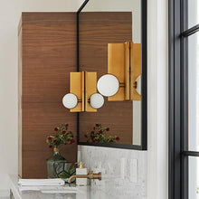 Load image into Gallery viewer, Orbel Wall Light in bathroom.
