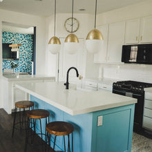 Load image into Gallery viewer, Orion Oval Pendant Light in dining room.

