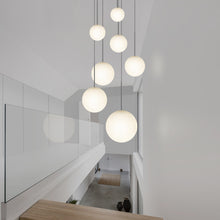 Load image into Gallery viewer, Bola LED Chandelier in stairs.
