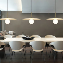 Load image into Gallery viewer, Bola LED Disc Pendant Light in living room.
