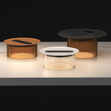 Load image into Gallery viewer, Carousel LED Table Lamp in exhibition.

