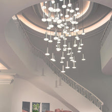 Load image into Gallery viewer, Cielo LED Chandelier in living room.
