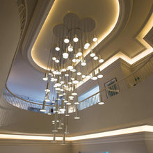 Load image into Gallery viewer, Cielo LED Chandelier in living room.
