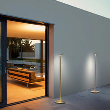 Load image into Gallery viewer, Luci LED Floor Lamp in Outside Area.
