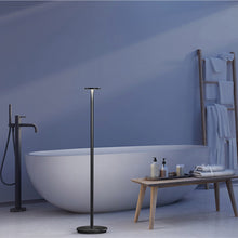 Load image into Gallery viewer, Luci LED Floor Lamp in bathroom.

