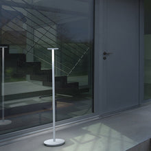 Load image into Gallery viewer, Luci LED Floor Lamp in Outside Area.
