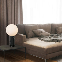 Load image into Gallery viewer, Pilar Table Lamp in living room.
