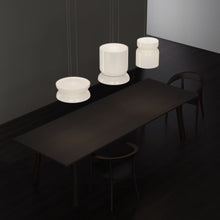 Load image into Gallery viewer, Totem Up/Down LED Pendant Light in living room.
