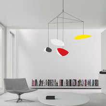 Load image into Gallery viewer, Papillons™ 4-Light LED Pendant Light in living room.
