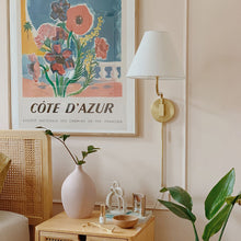Load image into Gallery viewer, Patti Wall Light in living room.

