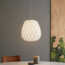 Load image into Gallery viewer, Pinecone Pendant Light in living room.
