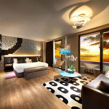 Load image into Gallery viewer, Pirce LED Suspension Light in living room.
