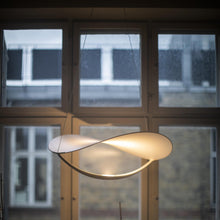 Load image into Gallery viewer, Plena LED Pendant Light in living room.
