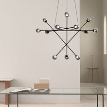 Load image into Gallery viewer, Proton™ Alpha LED Pendant Light in living room.
