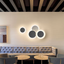 Load image into Gallery viewer, Puck 5491 LED Wall Art Light in living room.
