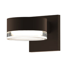Load image into Gallery viewer, Reals Up/Down Outdoor LED Wall Light in Textured Bronze/Plate Lens/Clear Cylinder Lens.
