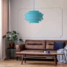 Load image into Gallery viewer, Pierce Large Pendant Light in living room.
