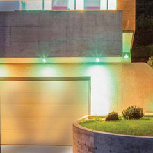Load image into Gallery viewer, Starfish S11277 - 15 Watts PAR38 Wifi Smart LED Color-Changing Light Bulb in Outside Area.
