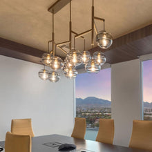 Load image into Gallery viewer, Sedona Triple Chandelier in dining room.
