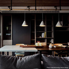 Load image into Gallery viewer, Castle Cone Pendant Light in living room.

