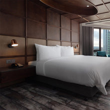 Load image into Gallery viewer, Dobi Wall Light in bedroom.
