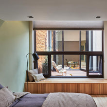 Load image into Gallery viewer, Dodo Floor Lamp in bedroom. 
