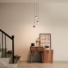 Load image into Gallery viewer, Dora LED Multi Light Pendant Light in living room.
