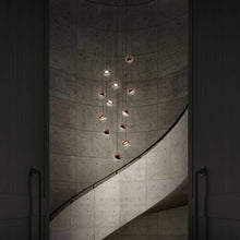 Load image into Gallery viewer, Dora LED Multi Light Pendant Light in stairs.
