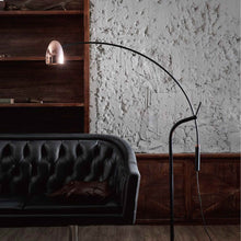 Load image into Gallery viewer, Hercules LED Floor Lamp in living room.
