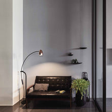 Load image into Gallery viewer, Hercules LED Floor Lamp in living room.
