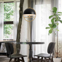 Load image into Gallery viewer, Huan LED Pendant Light in dining room.
