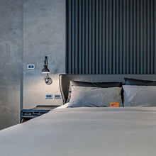 Load image into Gallery viewer, Laito Gentle Wall Lamp in bedroom.
