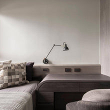 Load image into Gallery viewer, Laito Gentle Wall Lamp in bedroom.
