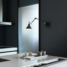 Load image into Gallery viewer, Laito Gentle Wall Lamp in dining room.
